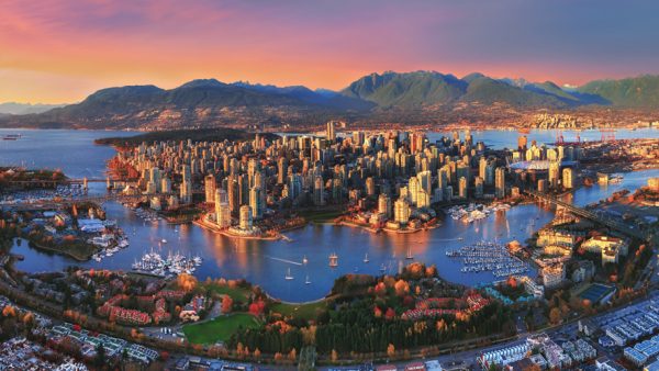 Aerial sunset over Vancouver - Credit: Tourism Vancouver/ Frannz Morzo Photography