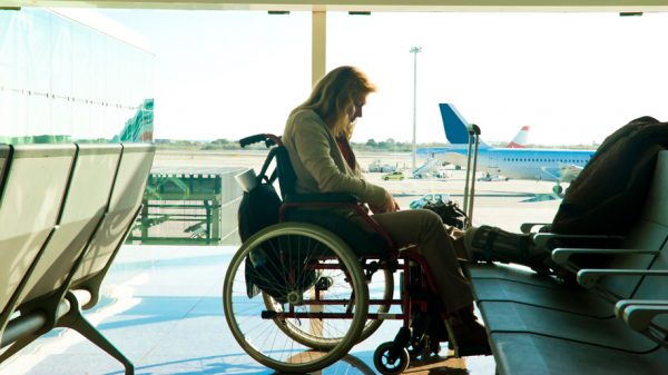 Disabled woman at the airport (iStock)