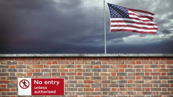 US flag and no entry sign (iStock.com/narvikk)