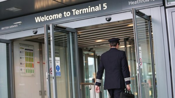 British Airways pilot arriving at Heathrow T5