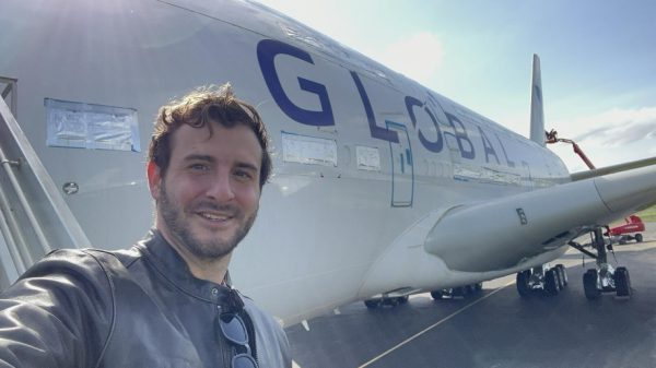 James Asquith outside a Global Airlines A380 aircraft (image from https://www.prnewswire.com/news-releases/global-airlines-agrees-purchase-of-three-more-a380s-and-makes-further-senior-appointments-to-advisory-board-301867052.html)