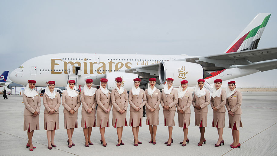 Cabin crew in front of an Emirates aircraft on display at the Dubai Airshow 2023 (Image: Supplied by Emirates)