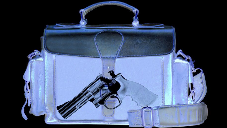 Xray scan detects weapon in briefcase (iStock)